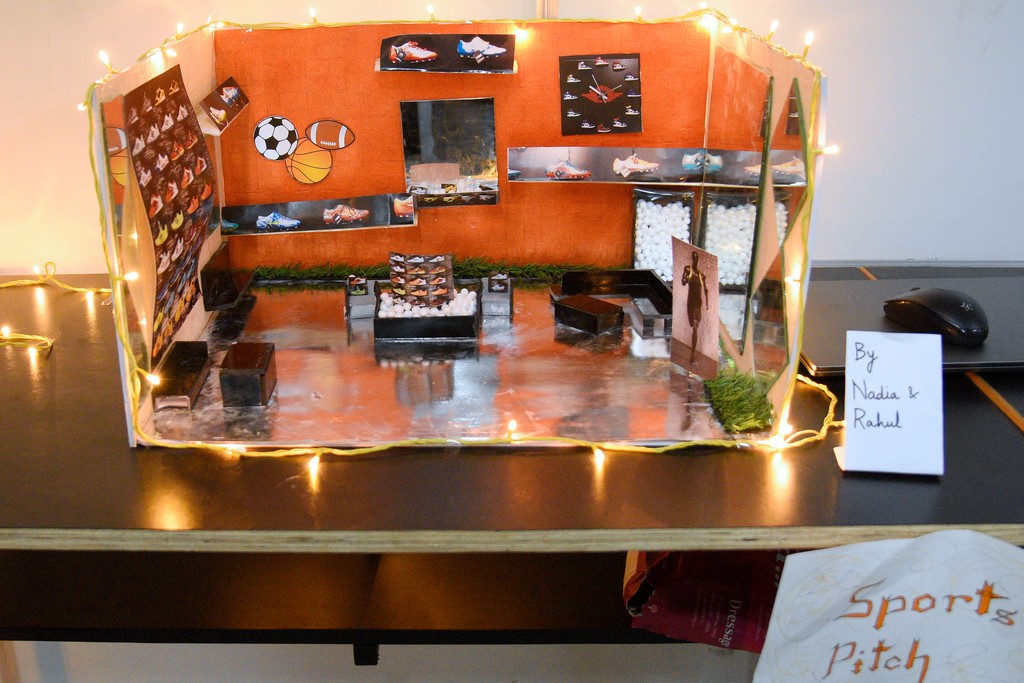 STUDENTS OF INTERIOR DESIGN DISPLAY MINIATURE RETAIL SPACE LAYOUTS 15