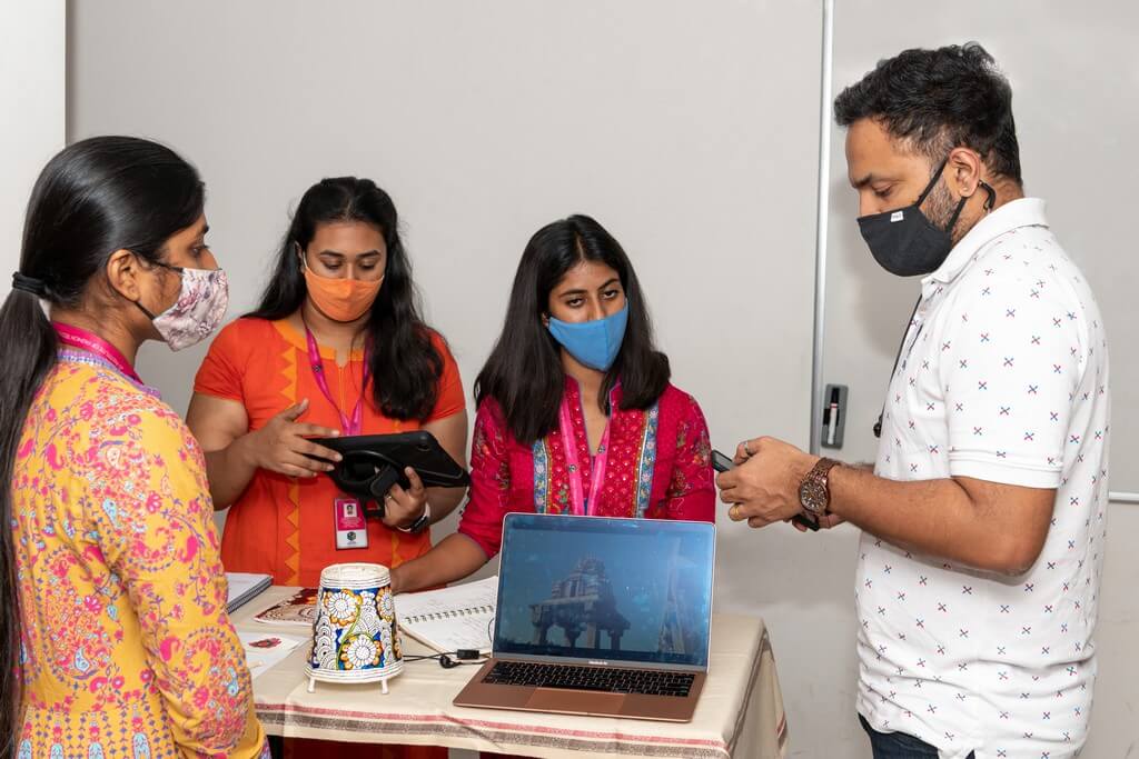 Sanati: Nimmalakunta leather craft of Andhra Pradesh leather craft - students disscussing with faculty - Sanati: Nimmalakunta leather craft of Andhra Pradesh 